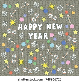 New Year's details on the background of a knitted sweater