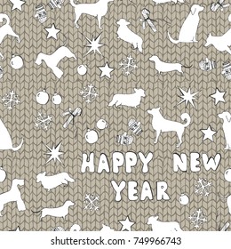 New Year's details on the background of a knitted sweater