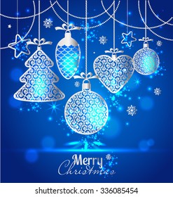 New Year's greeting card merry Christmas. Bright New Year's toys on a soft background with snowflakes.