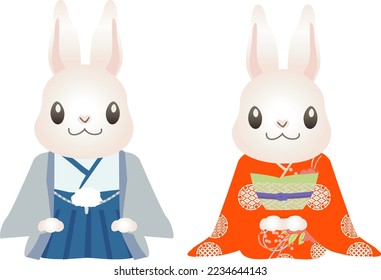 New Year's greetings from a kimono-clad rabbit and his wife.	