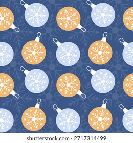 New Years pattern with cream and blue balls and snowflakes, festive Christmas atmosphere. On blue background.