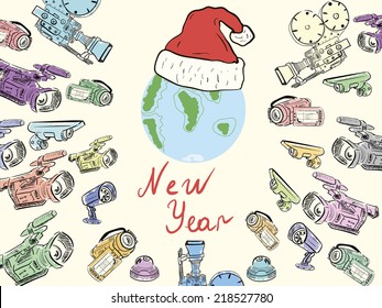 New Year's planet in a festive cap under video cameras