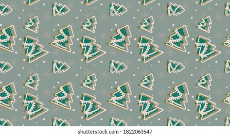 New year's seamless pattern of snowflakes and gingerbread on a blue background