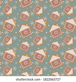New year's seamless pattern of snowflakes and gingerbread on a blue background