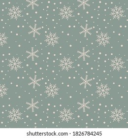 New year's seamless pattern of snowflakes on a blue background
