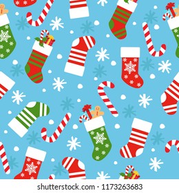 New Year`s vector seamless background with Christmas socks, candy, gifts and snowflakes