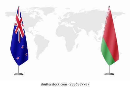 New Zealand and Belarusian flags for official meeting against background of world map.