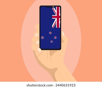 New Zealand flag on mobile phone screen, holding smartphone, advertising social media or banner concept, New Zealand flag showing on phone screen, technology news idea