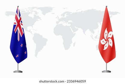 New Zealand and Hong Kong flags for official meeting against background of world map.
