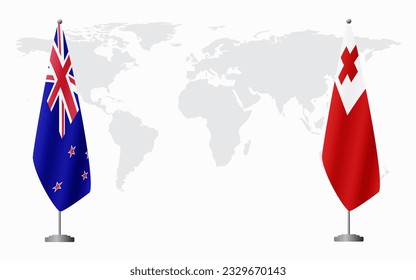 New Zealand and Tonga flags for official meeting against background of world map.