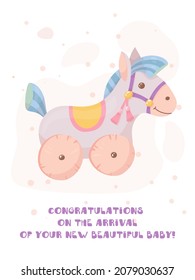 Newborn baby birthday card. Congratulations on the birth of a child. Toy horse on wheels. Vector illustration isolated on white background.