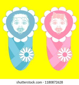 Newborns from the hospital in an envelope and with a pacifier. A girl and a boy.