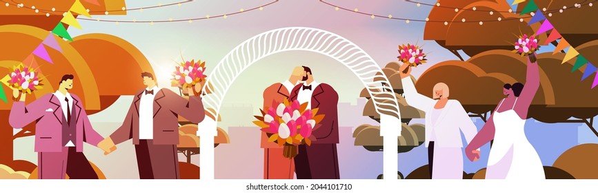 newlywed gay couple with flowers kissing near wedding arch transgender love LGBT community wedding celebration