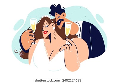 Newlyweds drink champagne at wedding ceremony and make toast wishing themselves happy family life. Newlyweds pose for joint portrait of bride and groom with glasses of sparkling wine in hands.