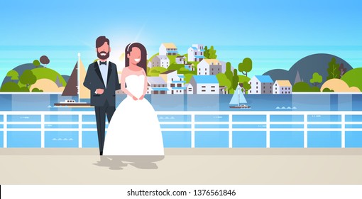 newlyweds man woman standing together romantic couple bride and groom embracing wedding day concept mountain city island landscape background horizontal