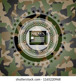 newspaper icon inside camo emblem