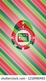 newspaper icon inside christmas emblem.