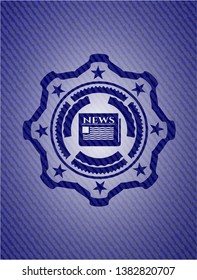newspaper icon inside emblem with denim texture
