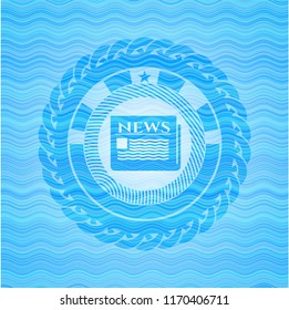 newspaper icon inside sky blue water emblem.