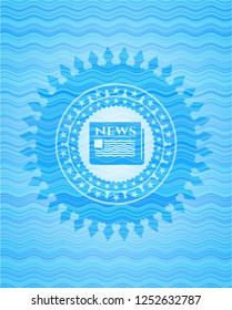 newspaper icon inside water emblem.