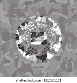 newspaper icon on grey camo texture