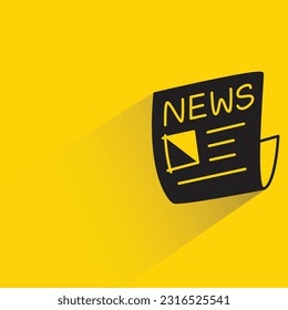 newspaper with shadow on yellow background
