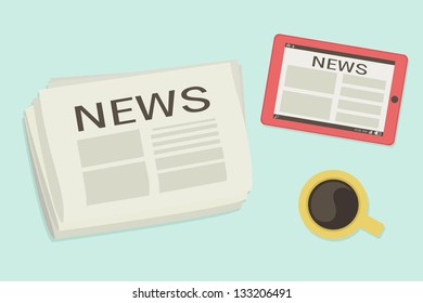 Newspaper and tablet