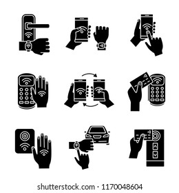 NFC technology glyph icons set. NFC bracelet, door lock, data transfer, smartphone, car. Near field communication. Contactless payment. Silhouette symbols. Vector isolated illustration