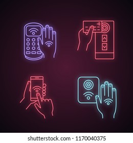 NFC technology neon light icons set. Near field payment terminal, hand sticker, credit card reader, smartphone, access control. Glowing signs. Vector isolated illustrations