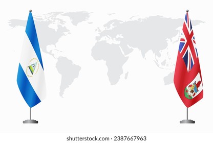 Nicaragua and Bermuda flags for official meeting against background of world map.