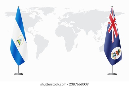 Nicaragua and Cayman Islands flags for official meeting against background of world map.