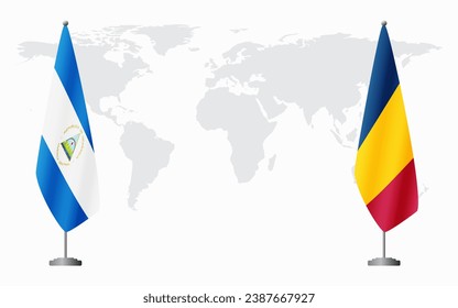 Nicaragua and Chad flags for official meeting against background of world map.