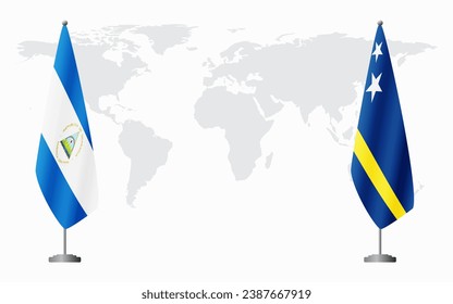 Nicaragua and Curacao flags for official meeting against background of world map.