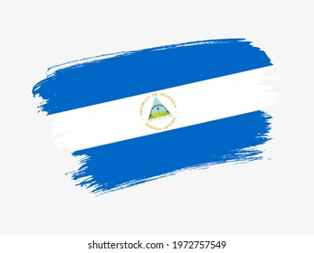 Nicaragua flag made in textured brush stroke. Patriotic country flag on white background