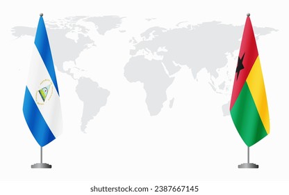 Nicaragua and Guinea Bissau flags for official meeting against background of world map.