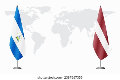 Nicaragua and Latvia flags for official meeting against background of world map.