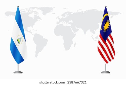 Nicaragua and Malaysia flags for official meeting against background of world map.