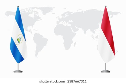 Nicaragua and Monaco flags for official meeting against background of world map.