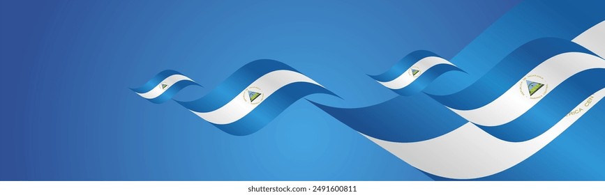 Nicaragua National Day waving flags two fold blue landscape background