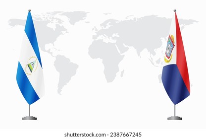 Nicaragua and Sint Maarten flags for official meeting against background of world map.