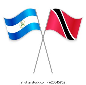 Nicaraguan and Trinidadian crossed flags. Nicaragua combined with Trinidad and Tobago isolated on white. Language learning, international business or travel concept.