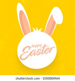 nice and beautiful abstract for Happy Easter with nice and creative bunny's ear design illustration in a textured yellow background.