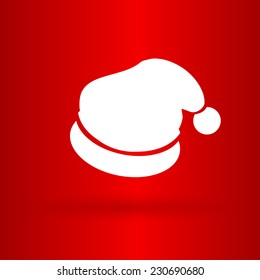 Nice and funny Christmas Santa's hat on the red background