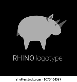 Nice logo of an animal. Cute rhino with grey body. Good choice of logotype for your company. Design of vector illustration on the black background.