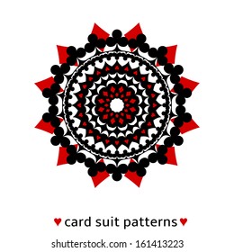 Nice ornament made from card suits. Ruby diamond suits play on black.