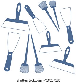 Nice picture of  colored brushes and spatulas on a white background
