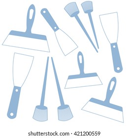 Nice picture of  colored brushes and spatulas on a white background