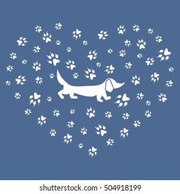 Nice picture of dachshund silhouette on a background of dog tracks in the form of heart on a colored background. 