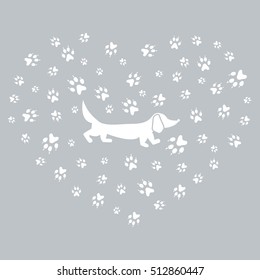 Nice picture of dachshund silhouette on a background of dog tracks in the form of heart on a colored background. 
