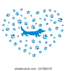 Nice picture of dachshund silhouette on a background of dog tracks in the form of heart on a white background.